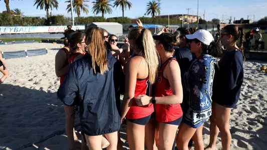 Beach Volleyball group huddle