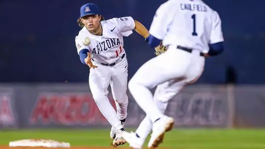 Nik McClaughry (11), Garen Caulfield (1) - TUCSON, ARIZ. -- Baseball vs West Virginia game 1 at Hi Corbett Field.
Feb. 24, 2023.
Photo by Rebecca Sasnett / Arizona Athletics