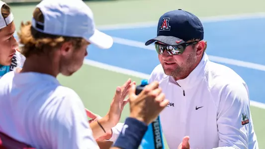 Clancy Shields, head coach, Jonas Ziverts, Jay Friend - TUCSON, ARIZ. -- Men’s Tennis vs. Oklahoma State in the Second Round of the NCAA Tournament at LaNelle Robson Tennis Center.
May 6, 2023.
Photo by Mike Christy / Arizona Athletics