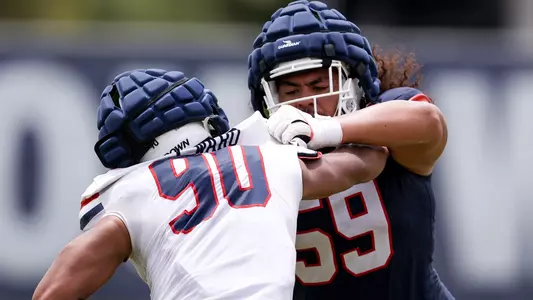 defensive lineman Isaiah Ward (90), offensive lineman Rhino Tapa'atouati (59) - TUCSON, ARIZ. -- Football Fall Camp Day 5
Aug. 7, 2023.
Photo by Catherine Regan / Arizona Athletics