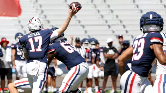 quarterback Brayden Dorman (17), offensive lineman Elijha Payne (63) - TUCSON, ARIZ. -- Football Scrimmage #1 at the Arizona Stadium
Aug. 12, 2023.
Photo by Catherine Regan / Arizona Athletics