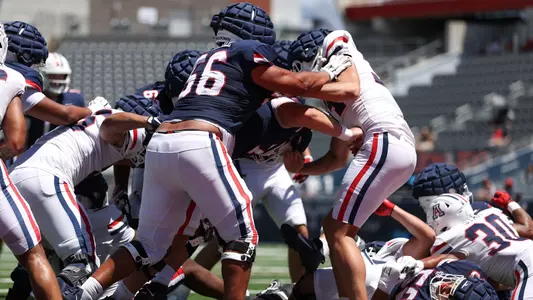 defensive lineman Bryce Echols (56), wide receiver AJ Jones (16) - TUCSON, ARIZ. -- Football Scrimmage #1 at the Arizona Stadium
Aug. 12, 2023.
Photo by Catherine Regan / Arizona Athletics