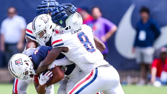 wide receiver Tetairoa McMillan (4), cornerback Treydan Stukes (2), linebacker Sterling Lane II (8) - TUCSON, ARIZ. -- Football fall practice #11 at Dick Tomey Fields.
Aug. 15, 2023.
Photo by Rebecca Sasnett / Arizona Athletics
