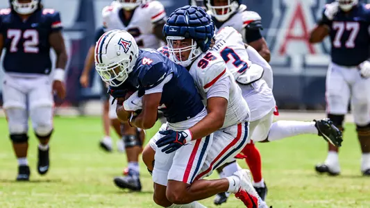 wide receiver Tetairoa McMillan (4), defensive lineman Keanu Mailoto (95) - TUCSON, ARIZ. —Football Practice Aug. 15, 2023.
Photo by Madison Farwell / Arizona Athletics