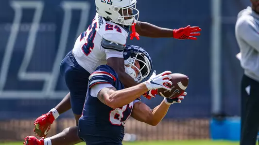 defensive back Jai-Ayviauynn Celestine (24), tight end Tyler Powell (87) -TUCSON, ARIZ. -- Football Fall Camp Day 12
Aug. 16, 2023.
Photo by Marison Bilagody / Arizona Athletics