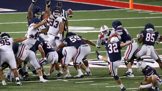 punter Cash Peterman (32), defensive lineman Jacob Kongaika (93), offensive lineman Rhino Tapa'atouati (59), punter Jordan Forbes (49) - TUCSON, ARIZ. -- Football First Look at the Arizona Stadium
Aug. 19, 2023.
Photo by Catherine Regan / Arizona Athletics