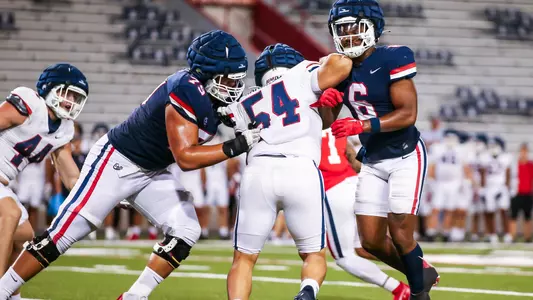 defensive lineman Chase Randall (54), running back Michael Wiley (6), offensive lineman Raymond Pulido (79) - TUCSON, ARIZ. -- Football mock game practice at Arizona Stadium.
Aug. 19, 2023.
Photo by Rebecca Sasnett / Arizona Athletics