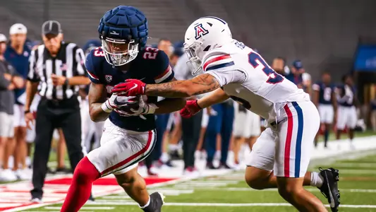 running back Stevie Rocker, Jr. (23), defensive back CJ Flores (35) - TUCSON, ARIZ. -- Football mock game practice at Arizona Stadium.
Aug. 19, 2023.
Photo by Rebecca Sasnett / Arizona Athletics