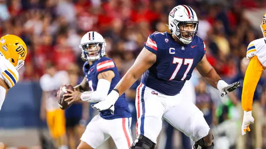 offensive lineman Jordan Morgan (77), quarterback Jayden de Laura (7) - TUCSON, ARIZ. -- Football vs. UTEP at Arizona Stadium.
Sept. 16, 2023.
Photo by Mike Christy / Arizona Athletics