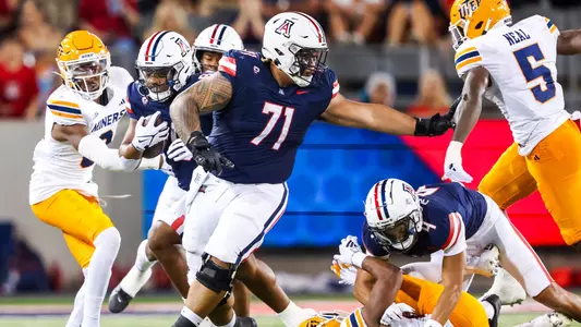 offensive lineman Jonah Savaiinaea (71), running back DJ Williams (8) - TUCSON, ARIZ. -- Football vs. UTEP at Arizona Stadium.
Sept. 16, 2023.
Photo by Mike Christy / Arizona Athletics