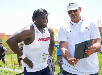 Michael Ogbeiwi, Lucais MacKay, throws coach - BOULDER, COLO. -- Track & Field competes in the 2024 Pac-12 Championships at Potts Field.
May 11, 2024.
Photo by Kirby Lee / Pac-12 Conference