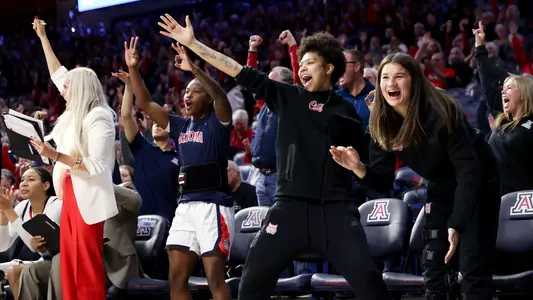 Bett Shelby, assistant coach, Kailyn Gilbert (15), Montaya Dew (3), Erin Tack (10) - TUCSON, ARIZ. -- Women’s Basketball vs University of California, Berkeley at the McKale Memorial Center
Jan. 26, 2024.
Photo by Catherine Regan / Arizona Athletics