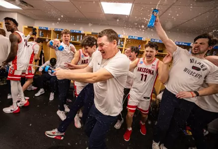 Rem Bakamus, assistant coach, Tommy Lloyd, head coach, Liam Lloyd (11), Jack Henderson, manager, Emmanuel Stephen (34) — SEATTLE, WASH. -- Men’s basketball vs. Oregon in the Second Round of the 2025 NCAA Tournament at Climate Pledge Arena.
March 23, 2025.
Photo by Mike Christy / Arizona Athletics