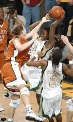 Sophia Young pulls down a rebound late in the second half over Texas' Heather Schreiber.
