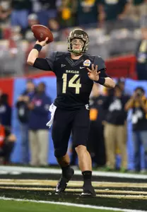 Bryce Petty throws a pass in the second quarter