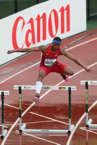 TJ Holmes won his heat of the 400-hurdles.