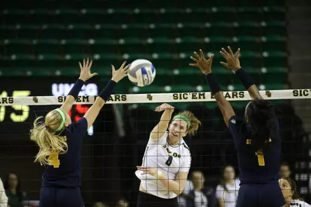 Andie Malloy and Katie Staiger combine for 41 kills, but Bears fall short on the road