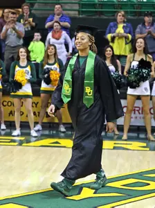 Basketballl's Alexis Prince received her diploma prior to basketball game since the team was in Florida during graduation ceremonies.