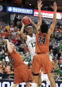 Nina Davis (13) shoots the ball in the second half against the Longhorns.