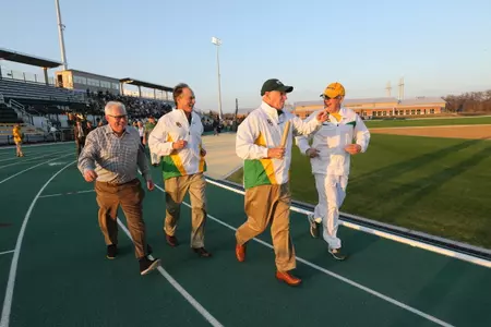Head Coach Todd Harbour and Director of Track & Field Clyde Hart.