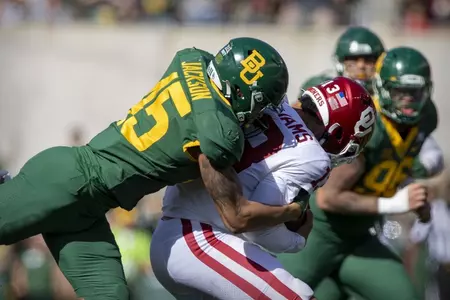 Bryson Jackson sacks OU quarterback Caleb Williams.