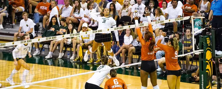 Lauren Harrison goes up for an attack against Texas