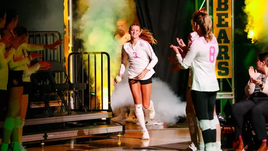 Averi Carlson takes the court prior to the match against Texas Tech.