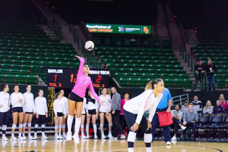 Lauren Briseño serves up the ball during the first set.
