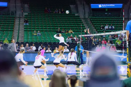 Lauren Harrison goes up for an attack during the first set.
