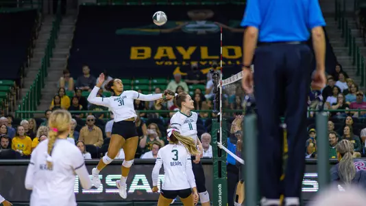 Lauren Harrison goes for a kill during the first set.
