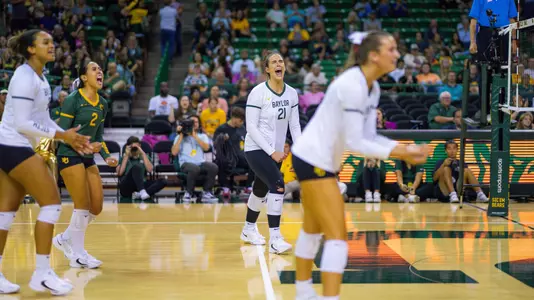 Elise McGhee celebrates a point during the second set.