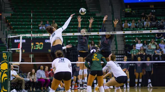 Elise McGhee goes for an attack in the fifth set.
