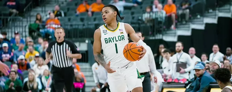 Keyonte George handles the ball against UVA