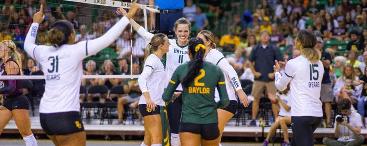 Mallory Talbert and team celebrate after kill against Texas A&M in Exhibition