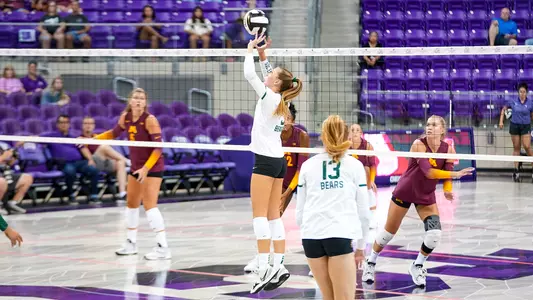 Averi Carlson setting vs. Minnesota
