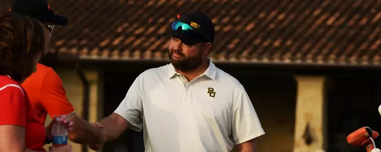 Jay Goble shaking hands at Big 12's