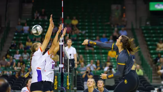 Elise McGhee goes for a kill against Evansville.