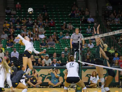 Riley Simpson goes for an attack against Colorado State.