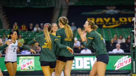 The Bears celebrate a point against McNeese.