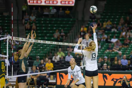 Riley Simpson tips the ball against Colorado State.