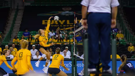 Allie Sczech goes for an attack against TCU.