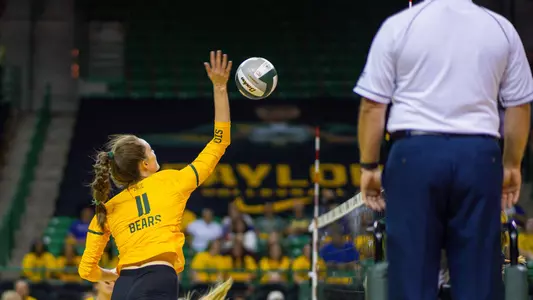 Mallory Talbert spikes the ball against the Horned Frogs.
