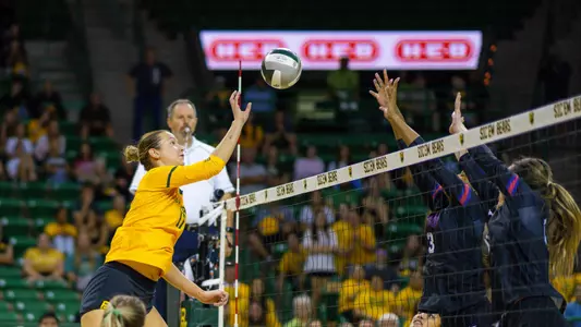 Kara McGhee tips the ball on TCU.
