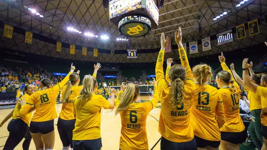 The Bears clear the bench to celebrate the 3-1 victory over TCU.