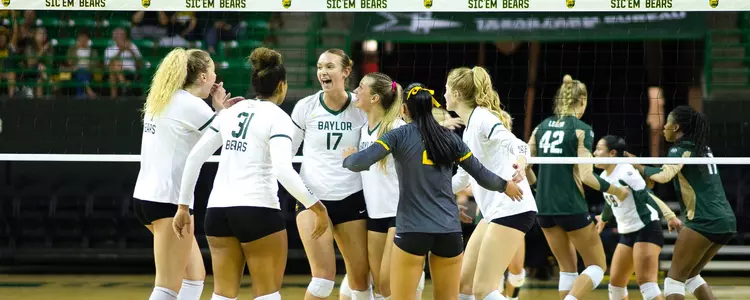 BU celebrates a kill against Colorado State