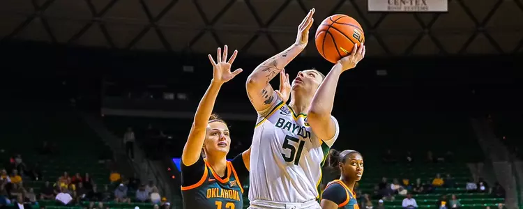 Caitlin Bickle goes up for an under-basket shot against Oklahoma State
