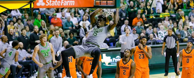Josh Ojiawuna dunks against Oklahoma State