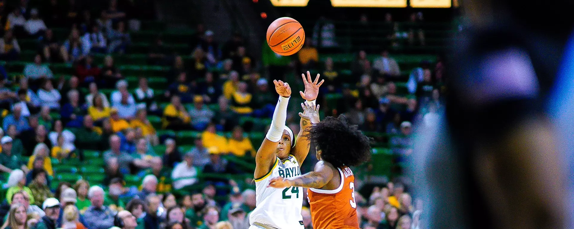 Sarah Andrews shoots a three against Texas