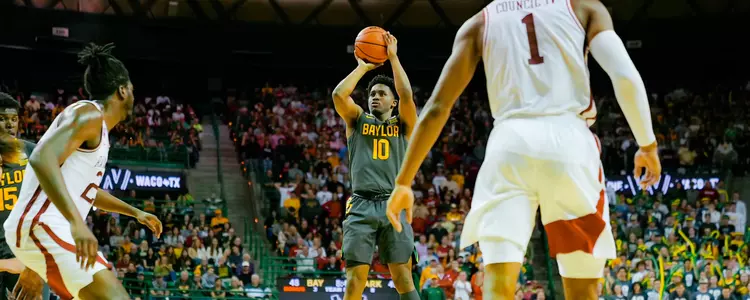 Adam Flagler shoots a jumper against Arkansas