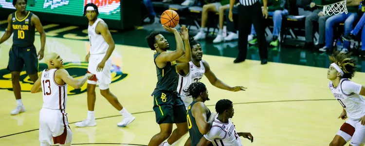 LJ Cryer goes for the layup against Arkansas